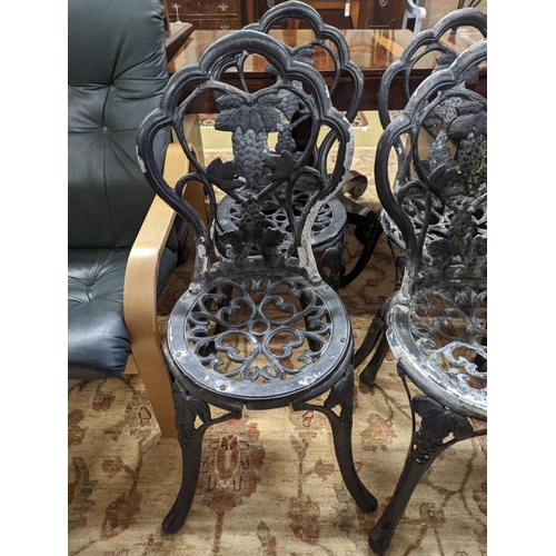 35 - A set of four aluminium garden chairs