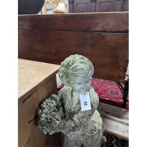 42 - Four reconstituted stone garden ornaments modelled as a flower seller, height 102cm, hare, seal and ... 