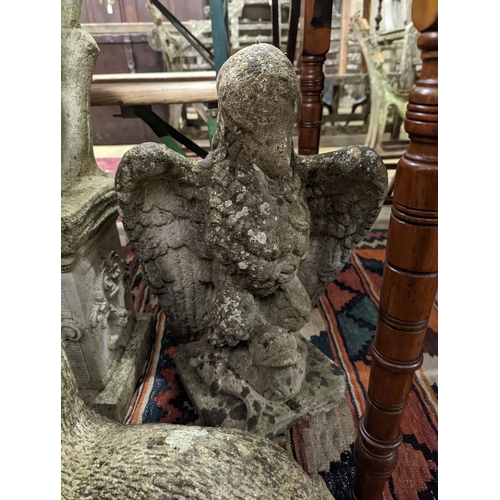 42 - Four reconstituted stone garden ornaments modelled as a flower seller, height 102cm, hare, seal and ... 