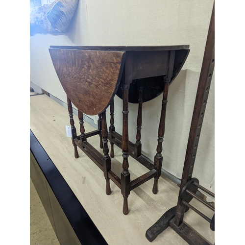 8 - A Sutherland spider leg table and bobbin/wool winder, height 105cm