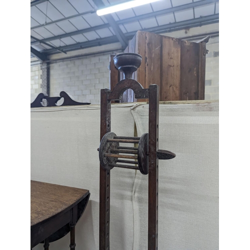 8 - A Sutherland spider leg table and bobbin/wool winder, height 105cm