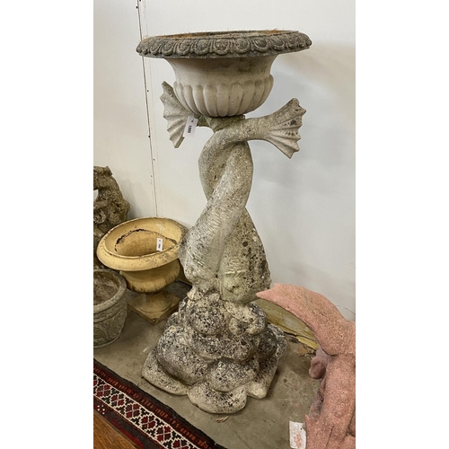 1005 - A large reconstituted stone dolphin garden planter, height 132cm