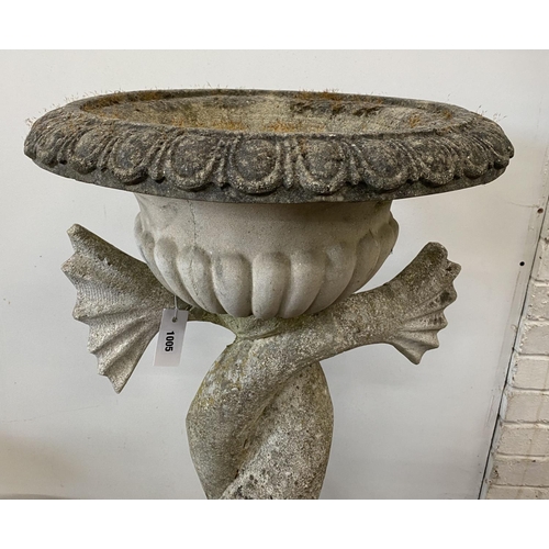 1005 - A large reconstituted stone dolphin garden planter, height 132cm