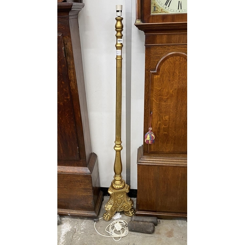 1011 - A gilt lamp standard, height 150cm