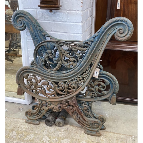 1015 - A pair of Victorian Coalbrookdale style painted cast iron bench ends, height 85cm