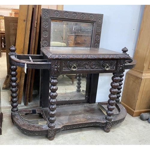 1017 - A late Victorian carved oak hall stand with mirror, width 125cm