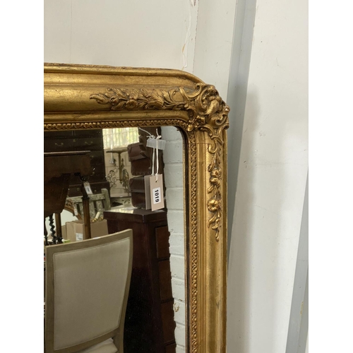 1019 - A 19th century French giltwood and gesso overmantel mirror, width 122cm, height 156cm