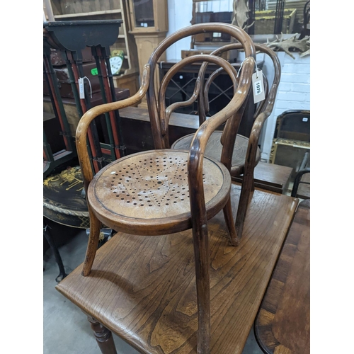 1036 - A near pair of early 20th century beech bentwood childs elbow chairs