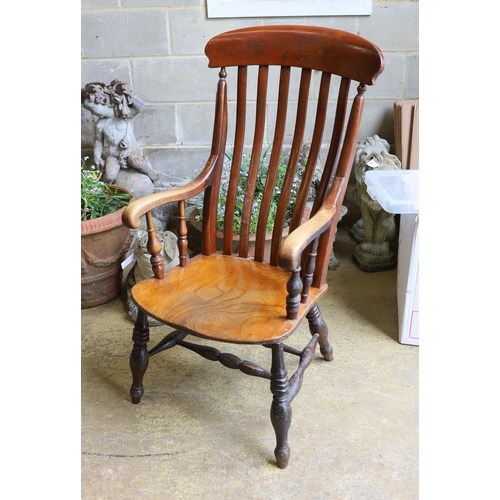 1037 - A Victorian elm and beech Windsor lathe back armchair.