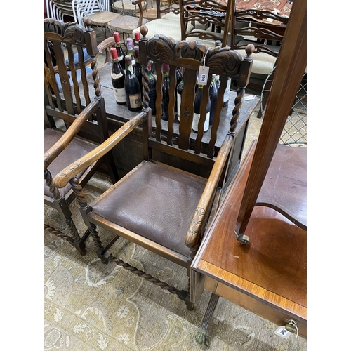 1046 - A pair of 1930s carved beech Carolean style elbow chairs