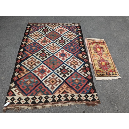 1048 - A Persian tribal Kelim carpet, 230 x 158cm and a Turkish bag