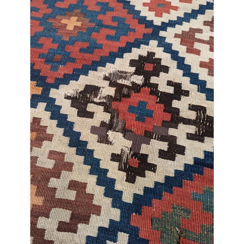 1048 - A Persian tribal Kelim carpet, 230 x 158cm and a Turkish bag