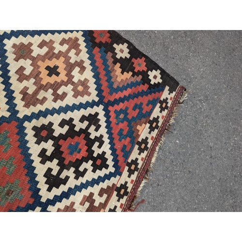 1048 - A Persian tribal Kelim carpet, 230 x 158cm and a Turkish bag