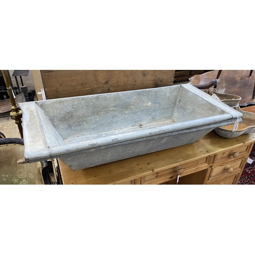 1050 - A pair of vintage rectangular galvanised troughs, width 111cm, depth 50cm, height 22cm