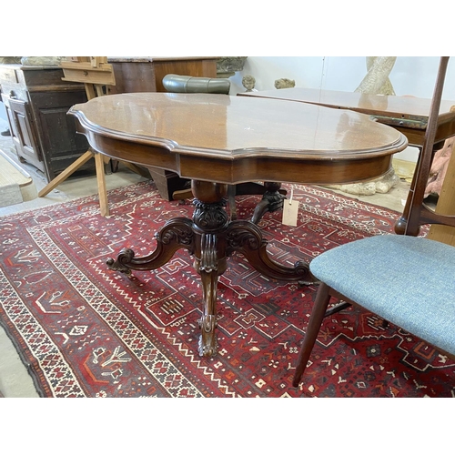 1068 - A Victorian oval rosewood tilt top centre table, width 132cm, depth 84cm, height 74cm