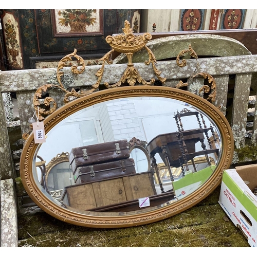 1092 - An Edwardian Adam design gilt framed oval mirror, width 82cm, height 74cm