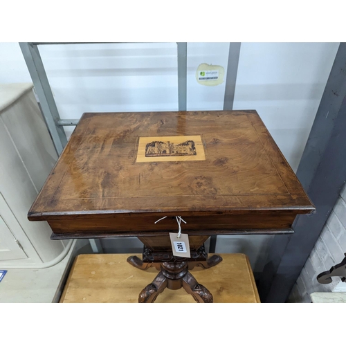 1111 - A Victorian walnut trumpet work table, the hinged top inset with a Tunbridge inlaid view of Eridge C... 