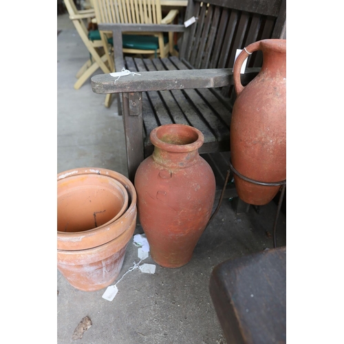 1122 - Two Greek style terracotta garden urns, one with iron stand, together with twelve assorted terracott... 