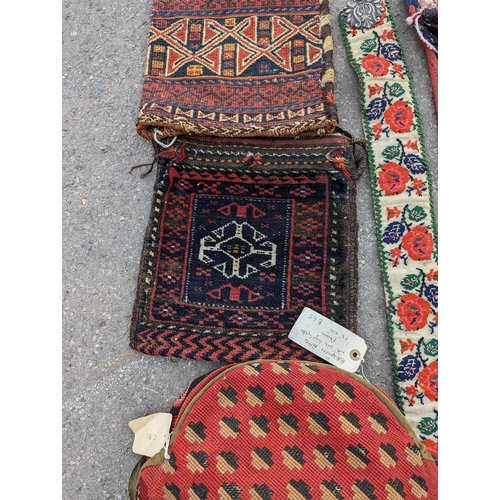 1126 - An Afghan Kilim flatweave saddlebag, 144 x 69cm together with six assorted bags, faces, etc.... 