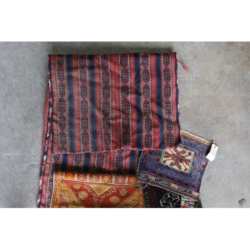 1126 - An Afghan Kilim flatweave saddlebag, 144 x 69cm together with six assorted bags, faces, etc.... 