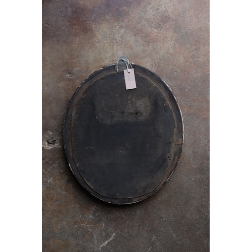 1129 - An Irish style oval silvered wall mirror, width 40cm, height 49cm