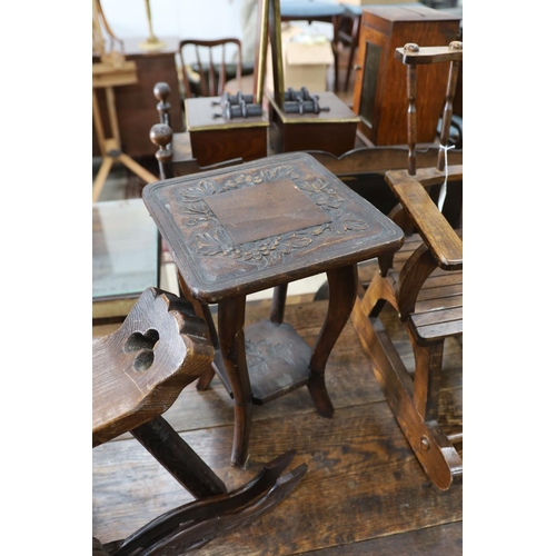 1132 - A small child's oak rocking chair, a pair of carved wood bellows and two caned tables