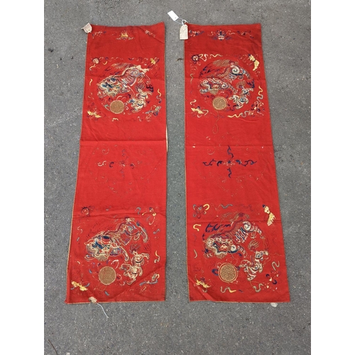 1145 - A pair of Chinese silk embroidered wall hangings, 46 x 152cm