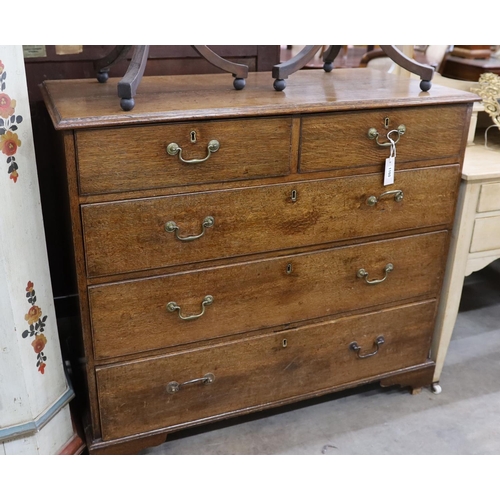 1160 - A George III provincial oak chest of two short and three long drawers, width 108cm, depth 52cm, heig... 