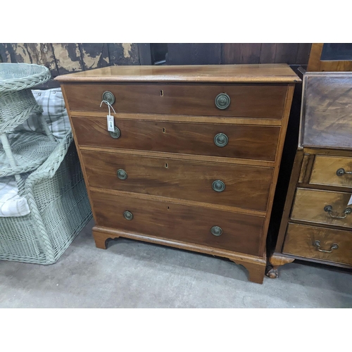 1165 - A Regency mahogany two part chest of four long drawers, width 100cm, depth 50cm, height 102cm... 