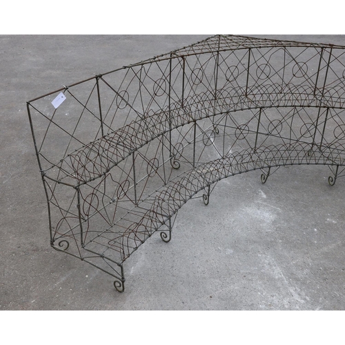 1183 - A wirework three tier corner pot stand, width 154cm, depth 180cm, height 68cm