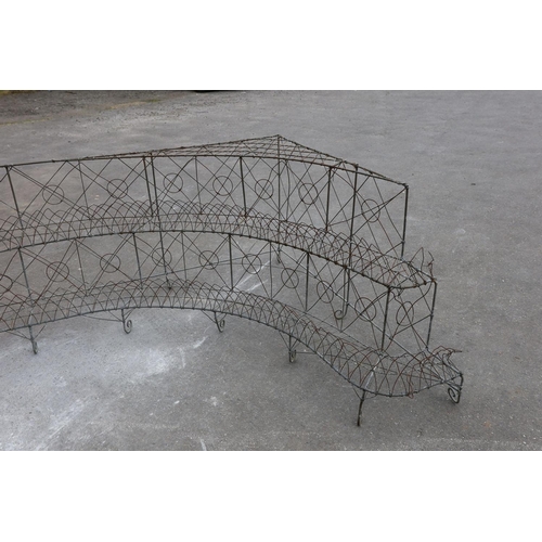 1183 - A wirework three tier corner pot stand, width 154cm, depth 180cm, height 68cm