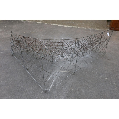 1183 - A wirework three tier corner pot stand, width 154cm, depth 180cm, height 68cm