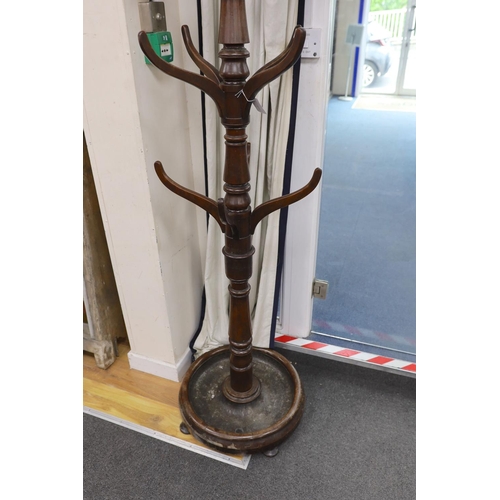 1188 - A mid Victorian mahogany hallstand, with circular lead lined base H 194cm.