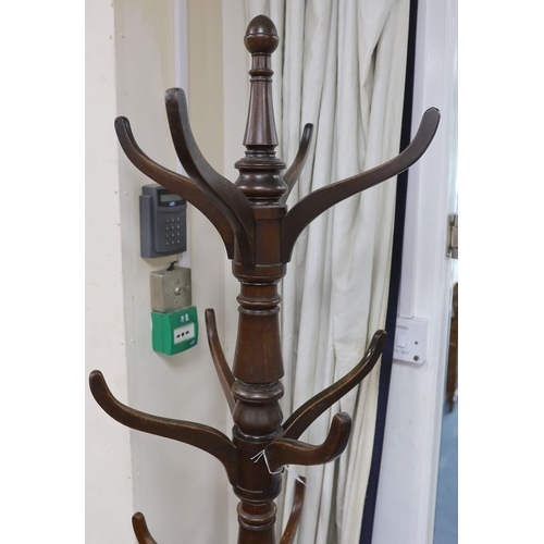 1188 - A mid Victorian mahogany hallstand, with circular lead lined base H 194cm.