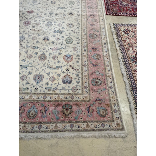 1190 - A Persian Tabriz ivory ground carpet, 410 x 300