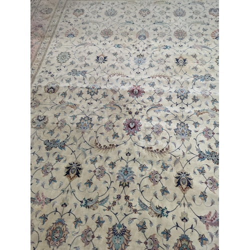 1190 - A Persian Tabriz ivory ground carpet, 410 x 300