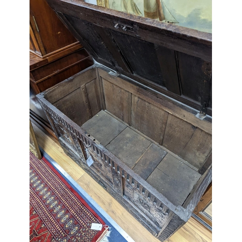 1193 - An 18th century oak mule chest with later carved decoration, length 103cm, depth 53cm, height 66cm... 