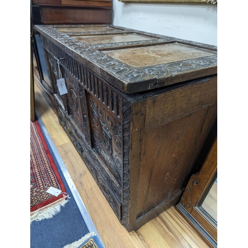 1193 - An 18th century oak mule chest with later carved decoration, length 103cm, depth 53cm, height 66cm... 