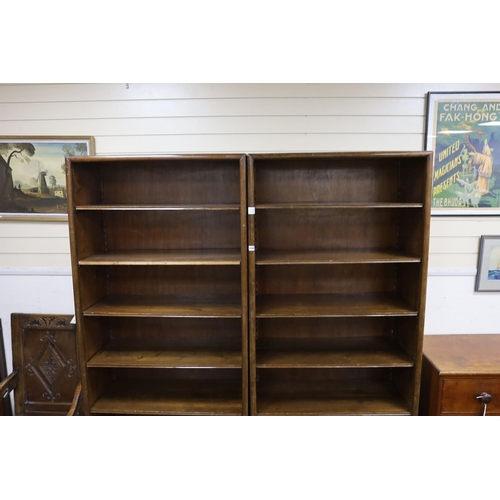 1198 - A pair of Hungarian mahogany and pine open fronted bookcases, with adjustable shelving, each width 8... 