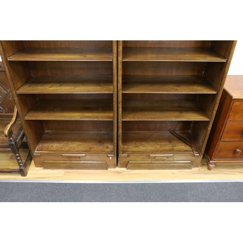 1198 - A pair of Hungarian mahogany and pine open fronted bookcases, with adjustable shelving, each width 8... 