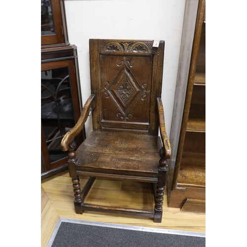 1199 - A late 17th century and later Halifax oak panel back armchair, width 52cm, depth 44cm, height 98cm... 