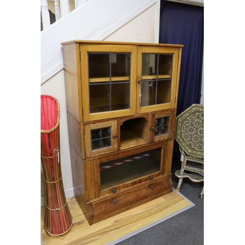 1204 - An early 20th century oak Globe Wernicke style four section oak bookcase, length 88cm, depth 36cm, h... 