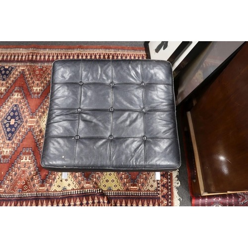 1211 - A Barcelona style black leather and chrome footstool, length 64cm, depth 57cm, height 37cm... 