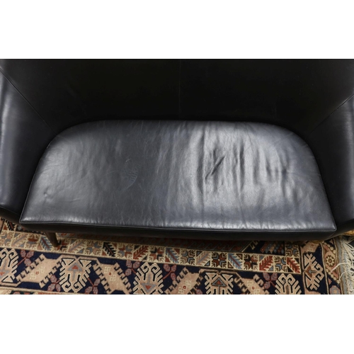 1216 - A mid century design black leather tub framed settee, length 136cm, depth 76cm, height 89cm... 