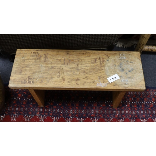 1218 - A Cotswold style small oak bench stamped 'W H Pinner', width 78cm, depth 27cm, height 34cm... 