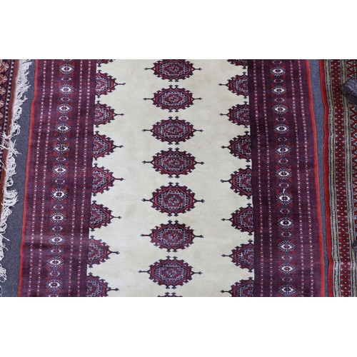 1223 - A Bokhara ivory ground rug, 190 x 125cm