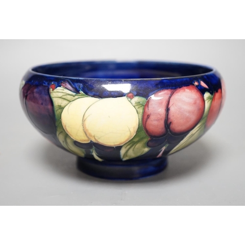 1256 - A Moorcroft Wisteria pattern bowl - 18cm wide