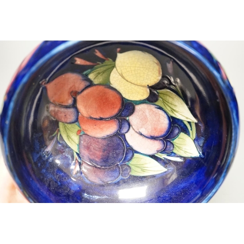 1256 - A Moorcroft Wisteria pattern bowl - 18cm wide