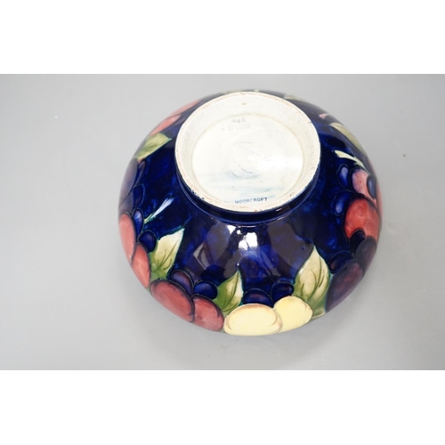 1256 - A Moorcroft Wisteria pattern bowl - 18cm wide