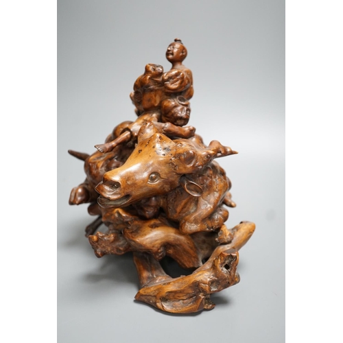 1260 - An 18th / 19th century Chinese rootwood figure of a boy on a buffalo 24cm